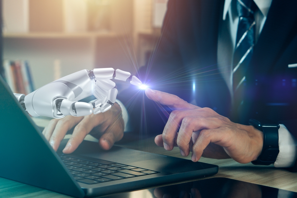 The New Job of IT: Supporting Humans and AI Side by Side
